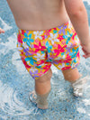 Ruffle Butts Endless Summer Floral Swim Trunks